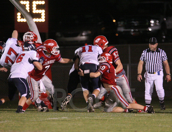 Tyler Mantooth and Matt Johnson stuffing the QB at the line of scrimmage1.jpg