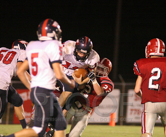 Steven Kehner bringing down the QB on Defense.jpg