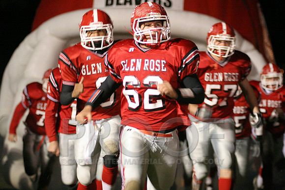 Charlie Young leading the beavers on the field.JPG