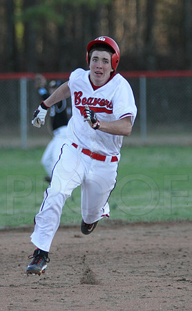 Collin Hunter rounding 2nd base in route for a triple