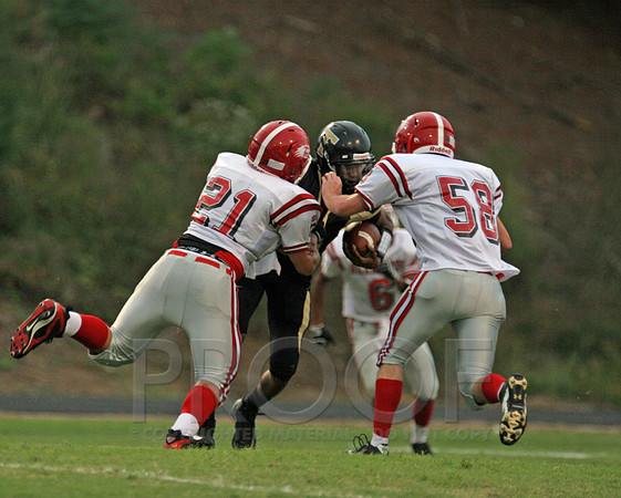 Ryan Taylor and another Glen Rose defender stopping the QB on the sack1.jpg