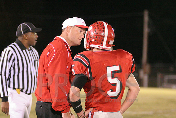 Coach Kehner getting in Dylan Ray's ear.JPG