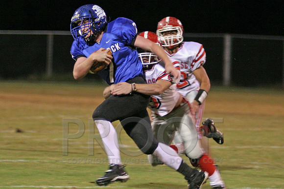 Dylan ray getting to the QB Colton Hughes.jpg