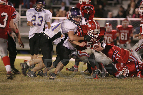 Dylan Ray trying to push backwards for yardage.JPG